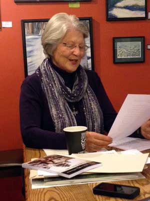 Photo of Myrtle Siebert doing a reading